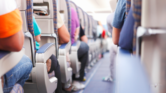 How to Keep Your Feet and Ankles Moving During a Long-Haul Flight